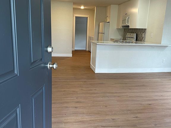 Entire interior updated with new flooring, blinds, paint, appliances