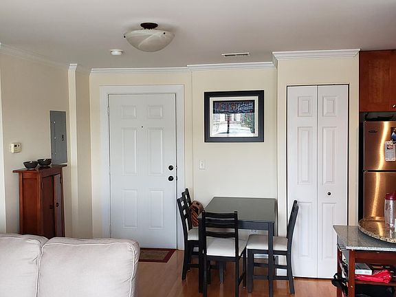 Dining area (between entry and coat closet).