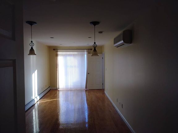 3rd image of 1054 67th St APT 1A