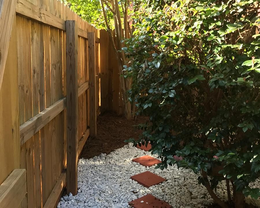 Private fenced rear patio with entrance gate!
