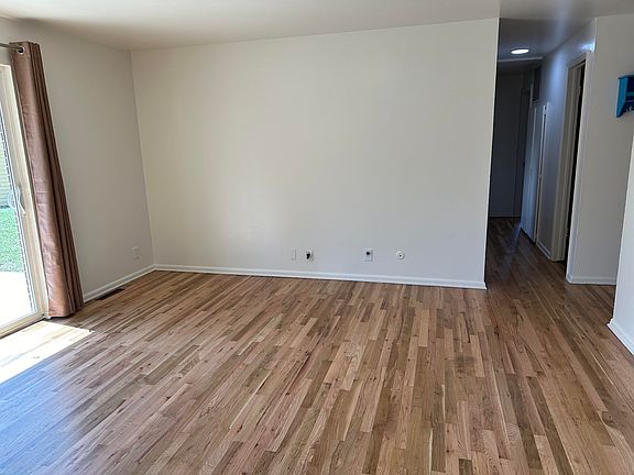 Living room. Hardwood floors just redone!