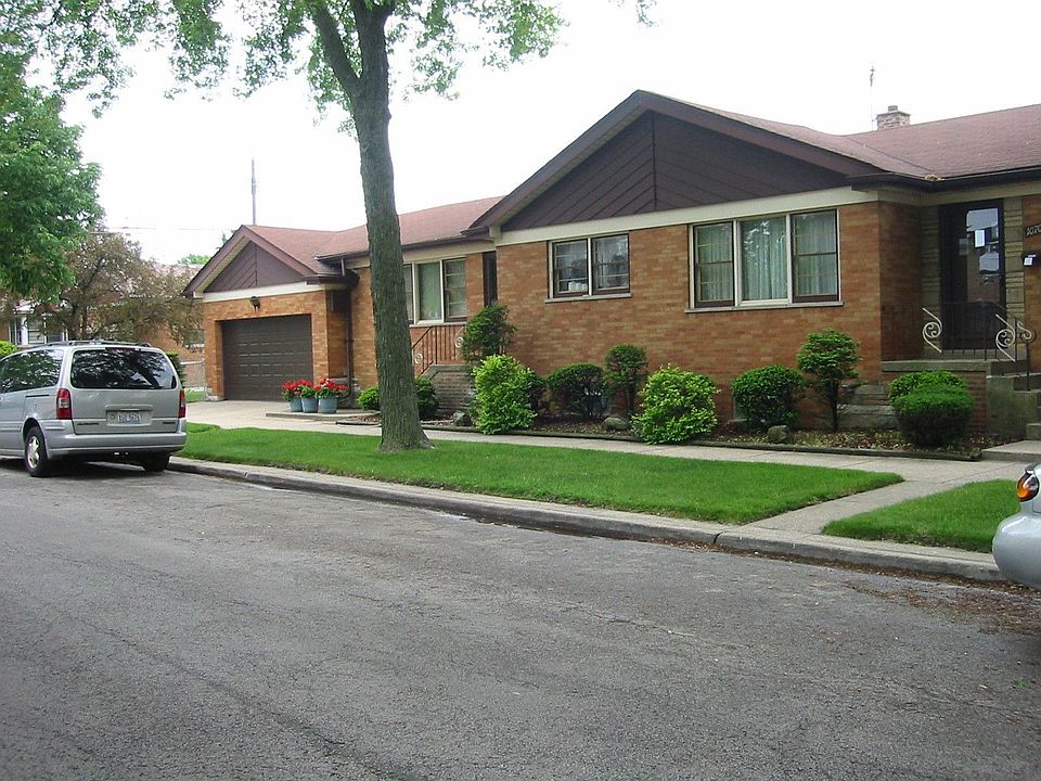 Side view with attached garage