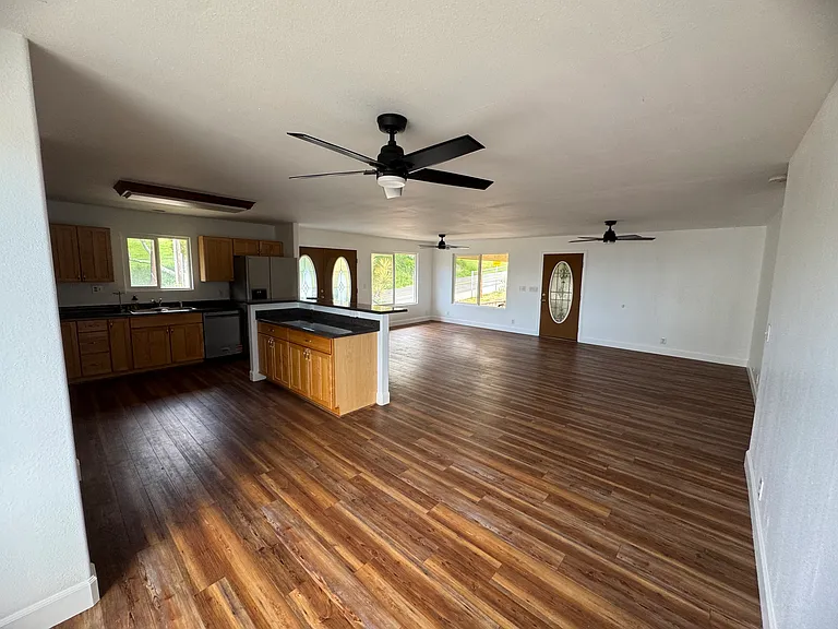 Open concept living room, dining room, kitchen