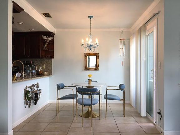 Dining area with previous tenant's furniture