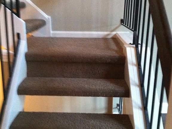 Main staircase with newer carpeting