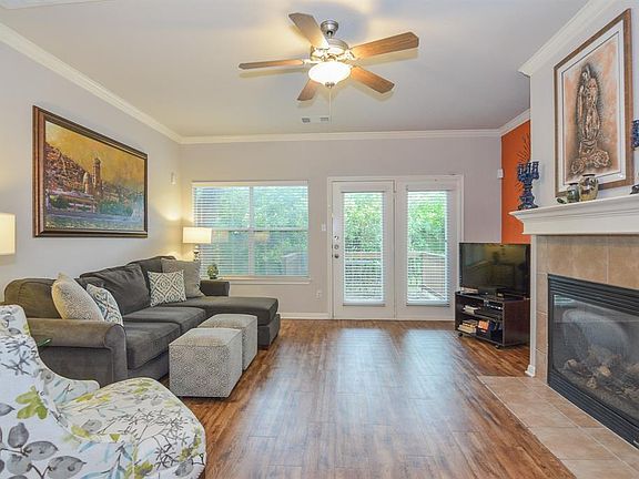 Cozy fireplace with easy electric gas log starter, will make this room a family favorite!