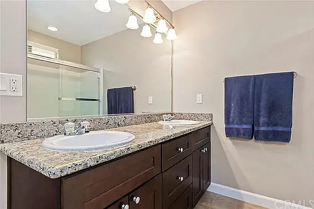 Master Suite Bathroom with dual sinks, large shower/bath