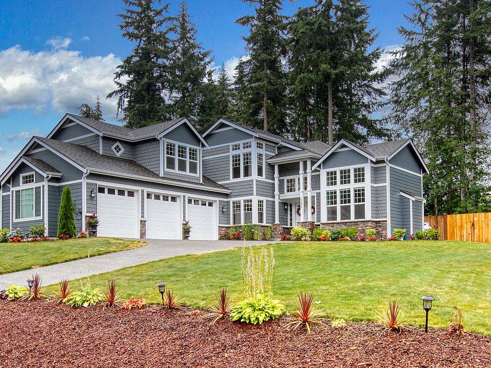 McIntosh Loop's largest home. Stunning and exceptional design and curb appeal.