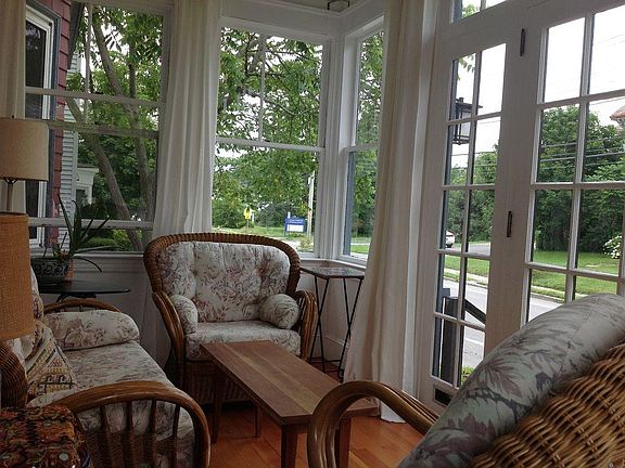 Sunroom comes unfurnished. Curtains included. 3 season room (unheated).