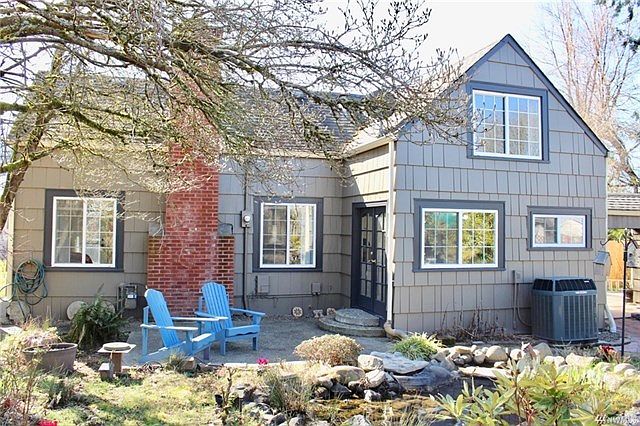 Charming vintage home with many recent updates including, updated baths, heat pump, vinyl windows, electrical panel and tank-less hotwater heater.