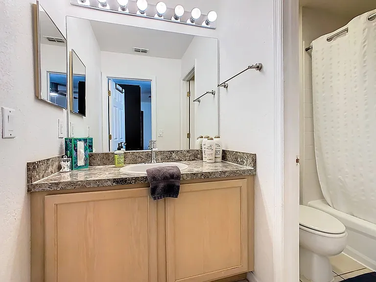Immerse yourself in luxury with a shower and bathtub combo, elevating your stay with ultimate comfort.