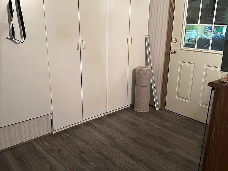 Large mudroom with storage could be second office space