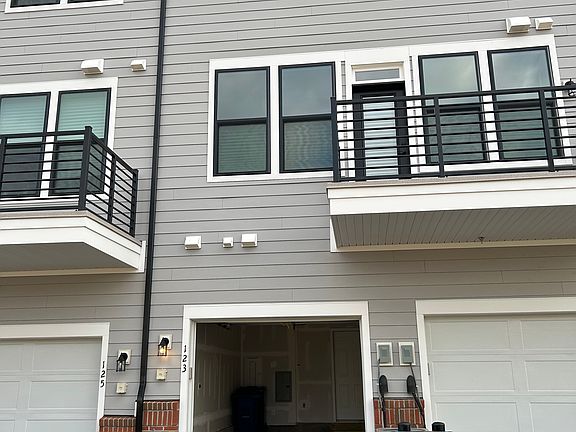Back of the unit with attached garage.