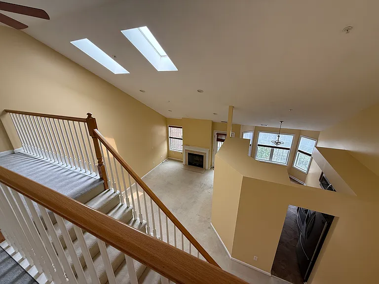 View from Loft to Living Room with Sky Lights