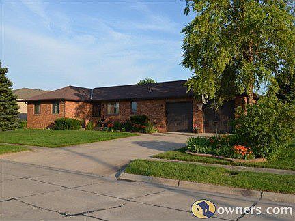 Front View looking South - All brick 5 bedroom / 3 bath