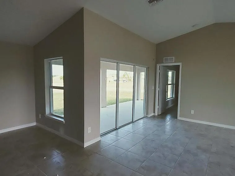 triple back sliders off living area to back lanai