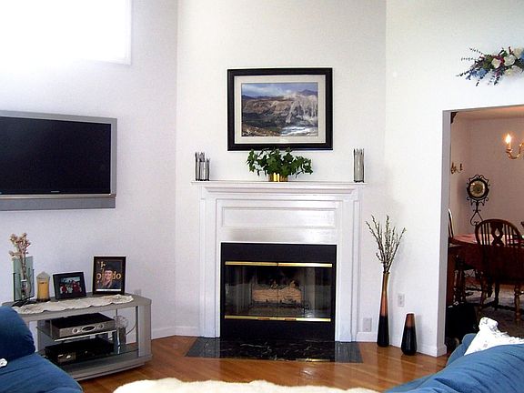 Spacious Sunny Living with Marble Hearthed Fireplace