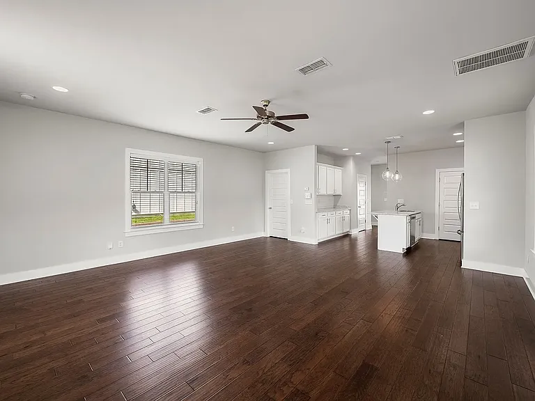 Living room facing the kitchen.
