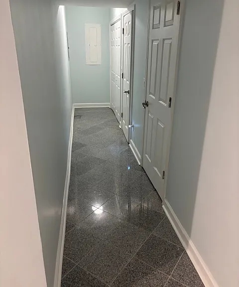 Downstairs hallway to storage and laundry
