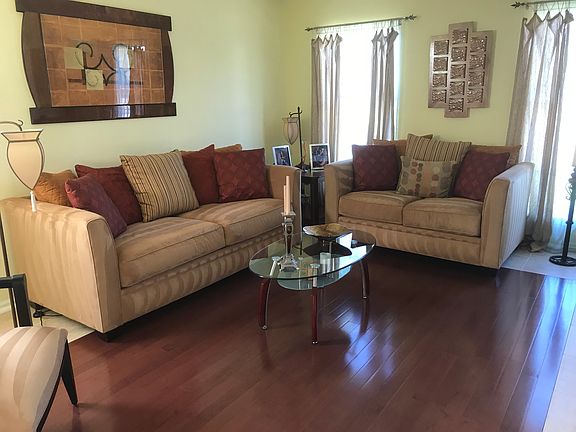 Hardwood surrounded by tile