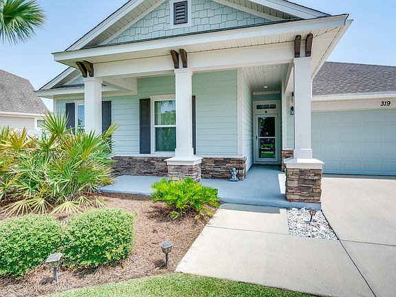 Beautifully kept exterior with inviting entry and plenty of space on the front lot.