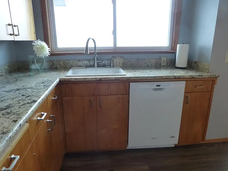New Dishwasher. View of beach from sink