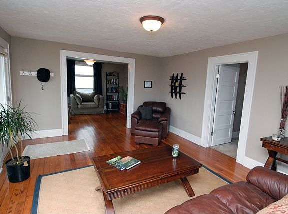 Beautiful millwork & gleaming hardwoods add to the vintage charm.