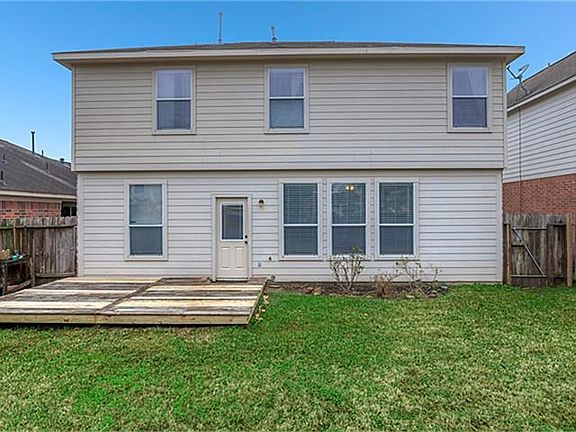 Lots of room to play or entertain in this backyard.