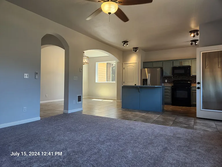 From living room to kitchen towards dining area