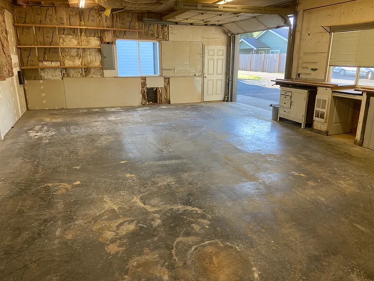 Sheet rock has been finished on the entire shop