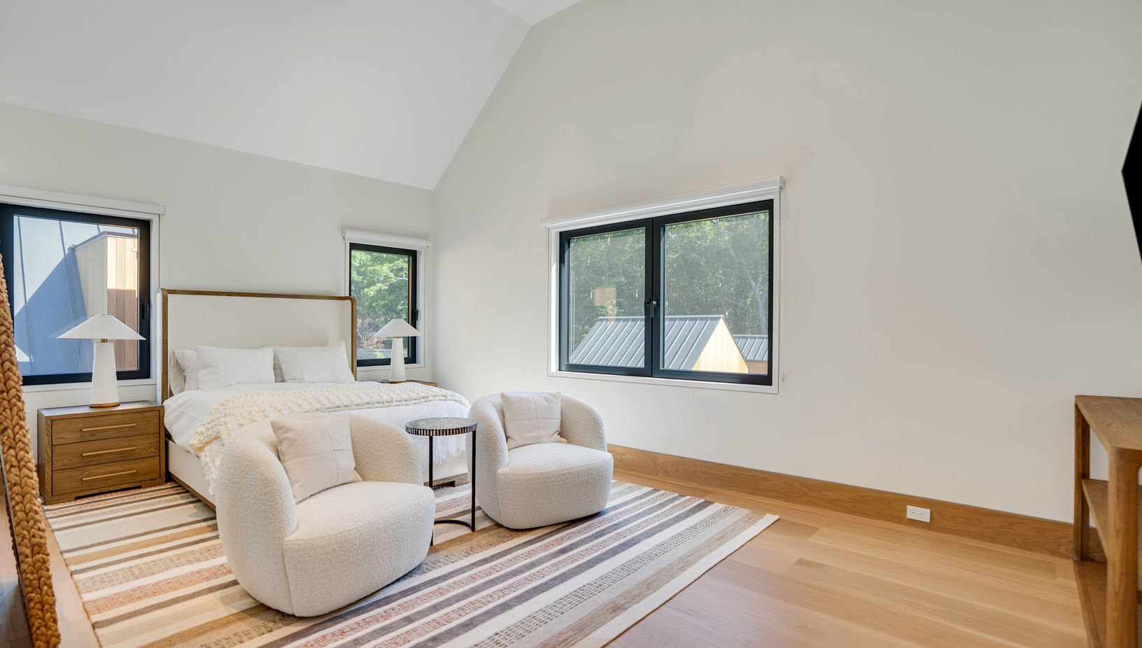  2nd floor large bedroom with cathedral ceilings and double door built in closets 