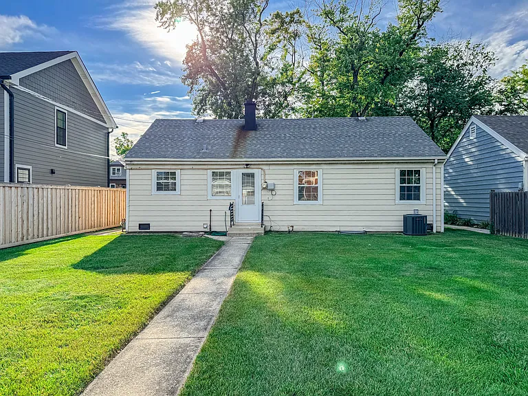 Backyard and rear entrance of the house