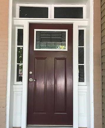 New Steel Exterior Door but maintained the historic millwork