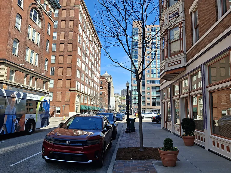 You can unload your groceries or luggage right in front. Street parking turns over frequently, and you can always find a nearby space. There's also a parking lot next door.