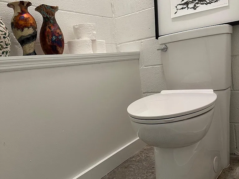 Toilet area to the Left of Vanity, 6'7" x 5'7"...