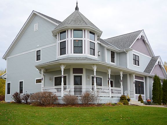 Turret, wrapped front porch.