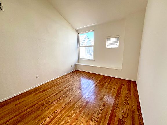 Master bedroom with newly installed wood flooring