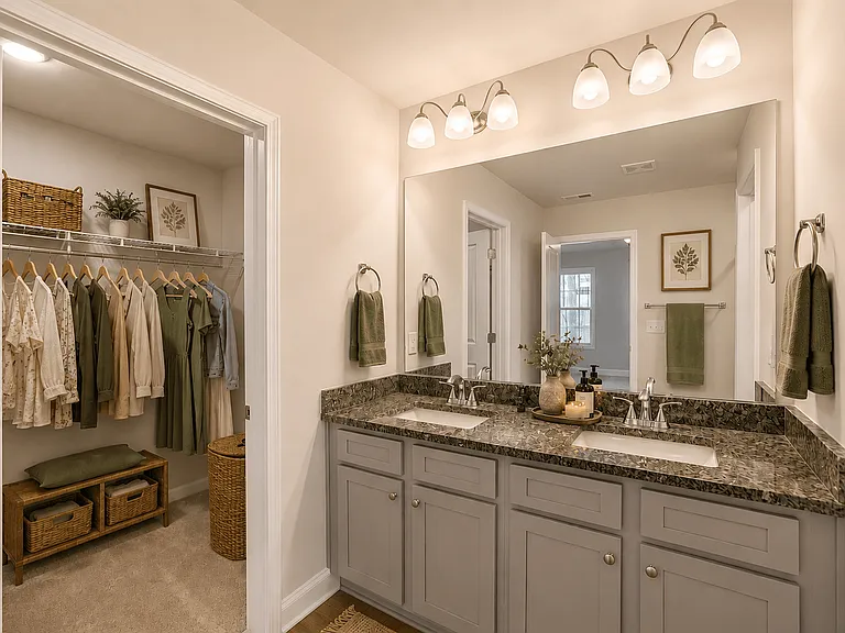 Secondary suite bathroom with a walk in closet.