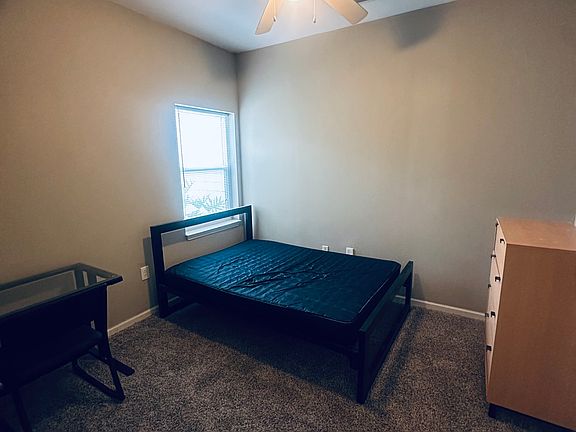 Carpeted foom with bedfram, bed, drawer and desk! If you wanted added comfort you could purchase a topper in full size.