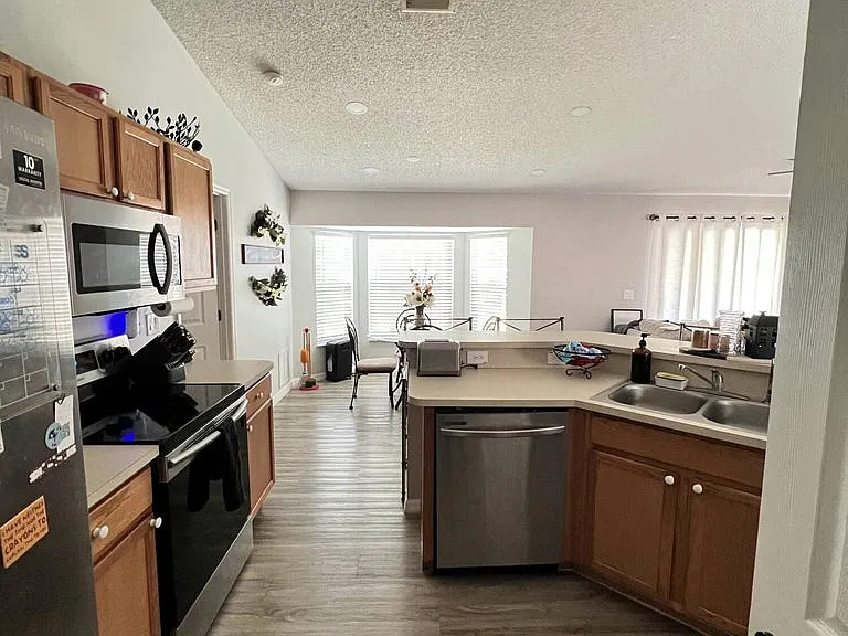 The heart of the home.
Open to the living and dining spaces so you're always part of the conversation.