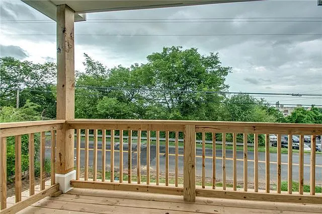 View from 3rd bedroom balcony, planter baskets & string lights not pictured