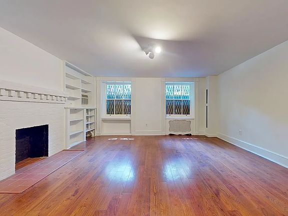 2nd image of 129 E 10th St APT 1