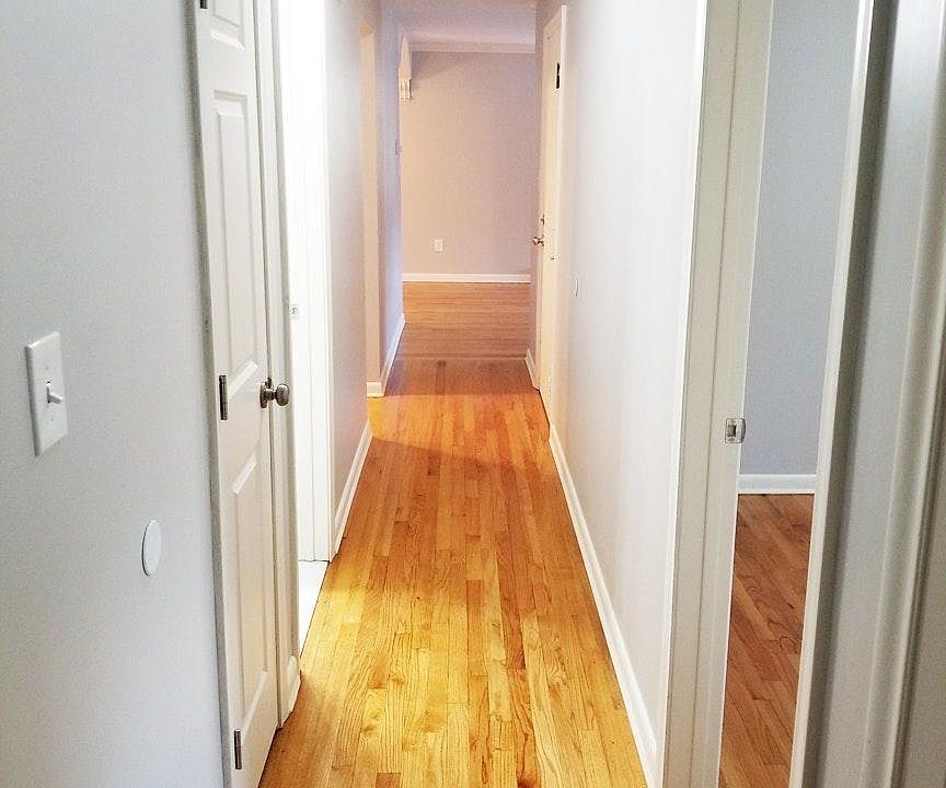 Hallway from last bedroom looking to living room