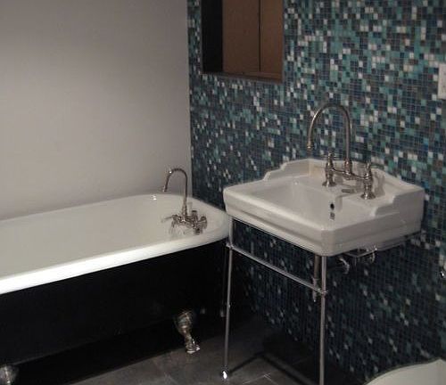 Custom glass tile in bath.