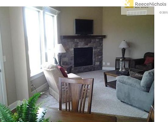 Let it Snow!  You're home snuggling in front of the fireplace... (photo from a prior model home).