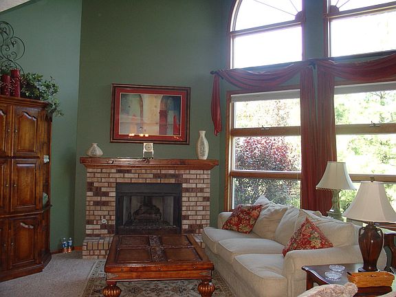 Beautiful, large great room with fireplace and magnificant wall of windows 