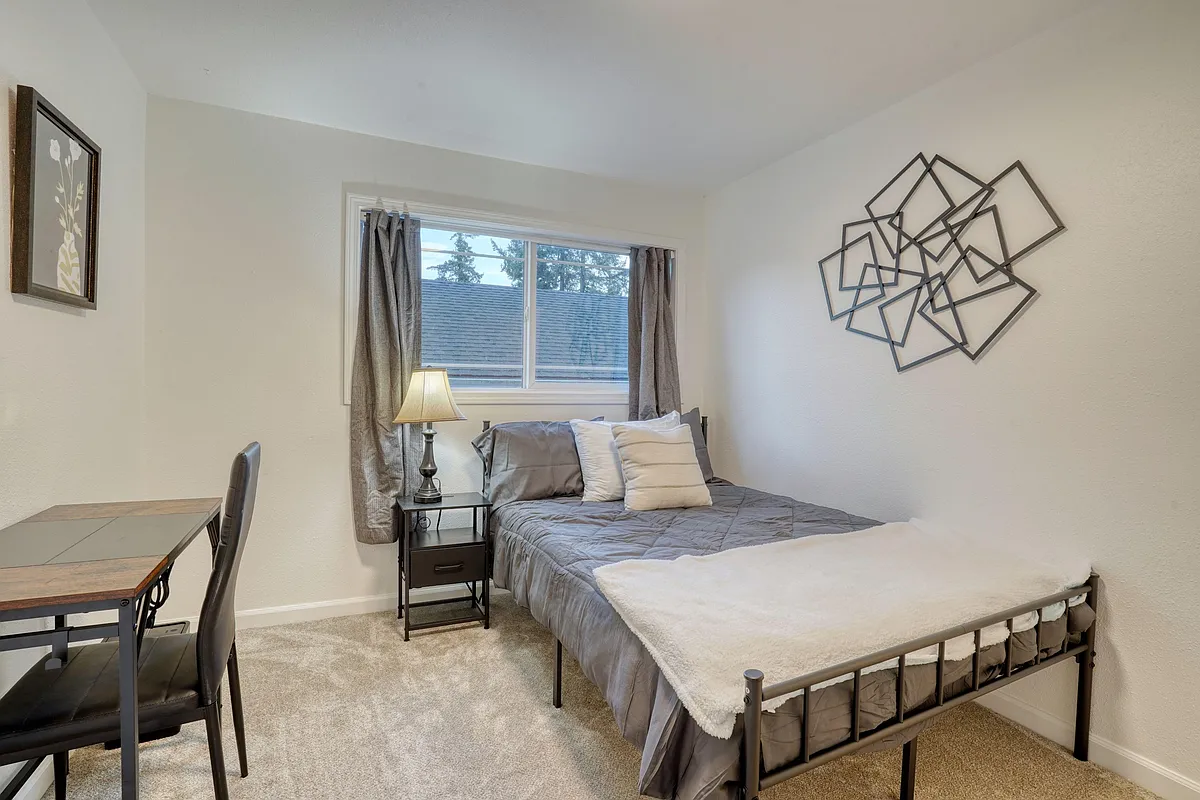 Get plenty of rest with black out curtains and a very comfortable bed. - SE Harold St