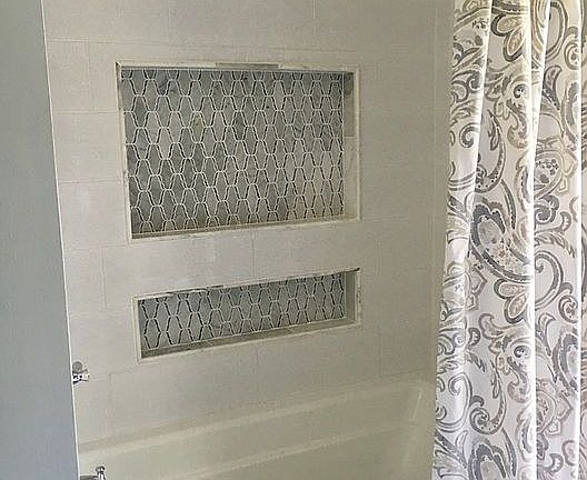 Deep soaker tub with shower