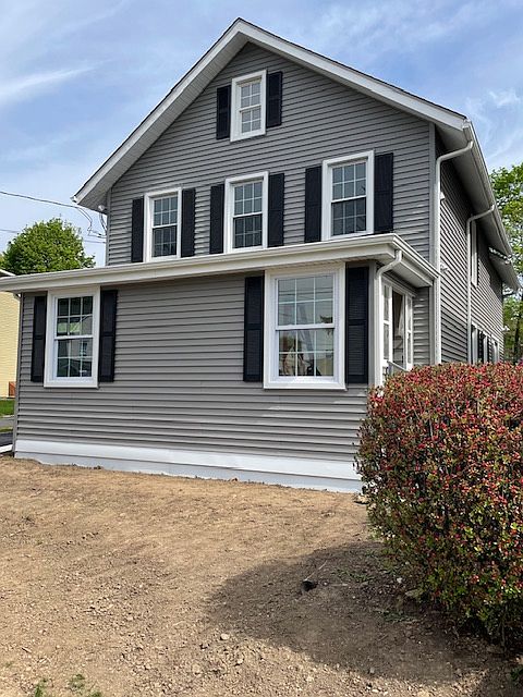 Front View - side porch on right side of home leads to second floor unit.