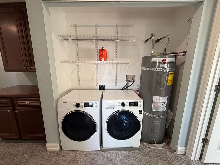 in unit new water heater + laundry dryer set